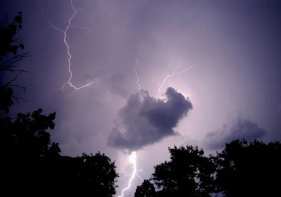 A cloud and lightning in the sky